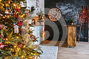 Christmas living room with a Christmas tree, gifts and clock. Beautiful New Year decorated classic home interior. Winter backgroun