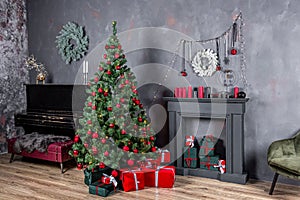 Christmas living room interior design with xmas tree decorated garland and ball, presents, gifts, fireplace and candles