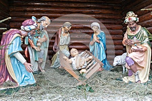 Christmas Manger scene with figures including Jesus, Mary, Joseph, sheep and magi