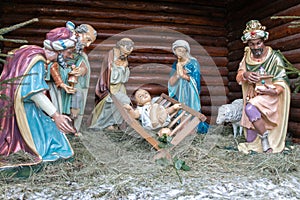 Christmas Manger scene with figures including Jesus, Mary, Joseph, sheep and magi