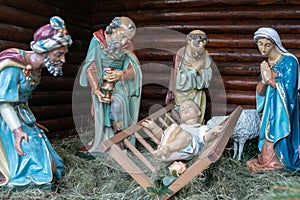 Christmas Manger scene with figures including Jesus, Mary, Joseph, sheep and magi