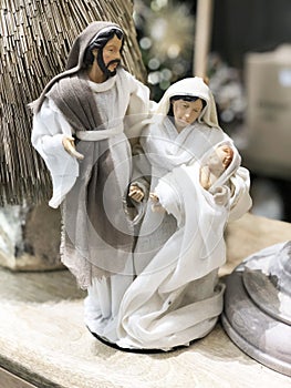 Christmas Manger scene with figurines including Jesus, Mary, Joseph.