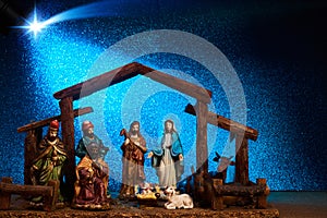 Christmas Manger scene with figurines including Jesus, Mary, Joseph