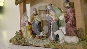 Christmas Manger scene with figurines including Jesus, Mary, Joseph, sheep and magi