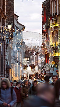 Christmas Market atmosphere in Strasbourg, France people illuminations shopping