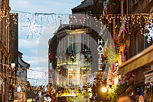 Christmas Market atmosphere in Strasbourg, France people illuminations shopping