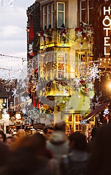 Christmas Market atmosphere in Strasbourg, France people illuminations shopping