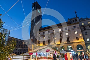 Christmas market in the evening. Stalls in Varese, square Monte Grappa, Italy