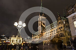 Christmas market Weihnachtsmarkt at Town Hall square in Hamburg, Germany