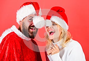 Christmas masquerade karnival concept. Couple cheerful face celebrate christmas. Man with beard and woman santa hat red