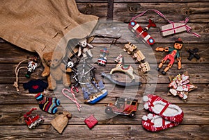 Christmas memories in childhood: old and tin toys on wooden back