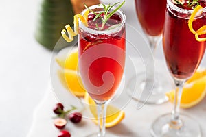 Christmas mimosas with cranberry juice and champagne or sparkling wine, festive Christmas cocktails