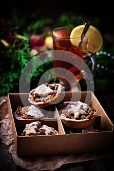 Christmas Mince pies on a Christmas rustic background