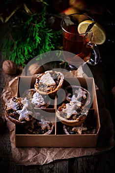 Christmas Mince pies on a Christmas rustic background