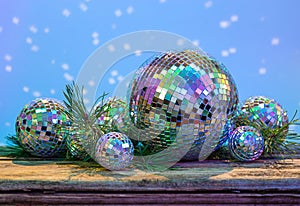 Christmas Mirror balls on wooden background