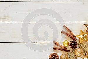 Christmas. Mockup christmas. Top view of gold christmas items cinnamon stars cones