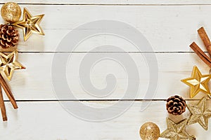 Christmas. Mockup christmas. Top view of gold christmas items cinnamon stars cones