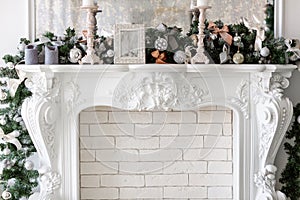 Christmas morning. classic luxury apartments with a white fireplace, decorated christmas tree. Holiday card.