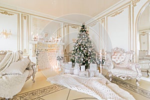 Christmas morning. luxury classic apartments with a white fireplace.