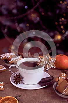 Christmas morning table. Handmade Christmas ginger cookies and hot coffee. Cozy warm home