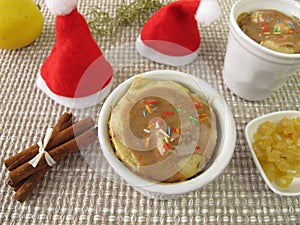 Christmas mug cake with succade and cinnamon icing photo