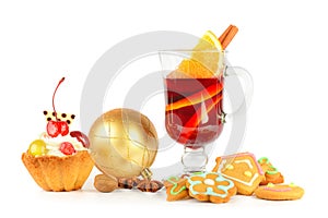Christmas mulled red wine with spices and fruits isolated on a white background