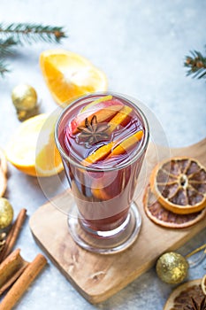 Christmas mulled wine delicious holiday like parties with orange cinnamon star anise spices. Traditional hot drink or beverage,