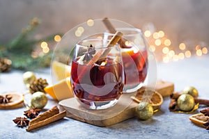 Christmas mulled wine delicious holiday like parties with orange cinnamon star anise spices. Traditional hot drink or beverage,