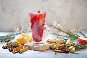 Christmas mulled wine delicious holiday like parties with orange cinnamon star anise spices. Traditional hot drink or beverage,