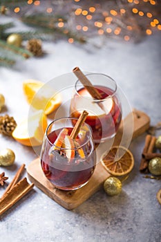 Christmas mulled wine delicious holiday like parties with orange cinnamon star anise spices. Traditional hot drink or beverage,