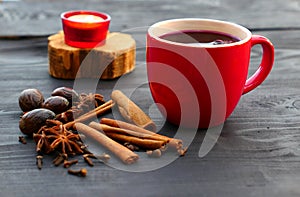 Christmas mulled wine with spices in red mug