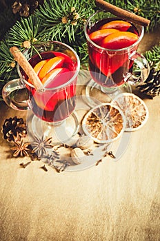 Christmas Mulled Wine, Spices and Xmas Tree Branches. Vintage Toned.