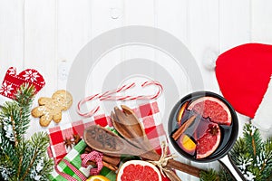 Christmas mulled wine on wooden table