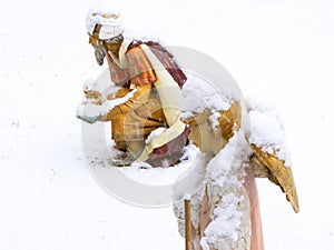 Christmas nativity scene, angel with lamb in the snow