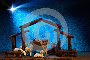 Christmas Nativity Scene of baby Jesus in the manger surrounded by the animals