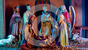 Christmas nativity scene. Christmas scene of born child baby Jesus Christ in the manger with Joseph and Mary.