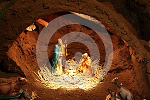 Christmas nativity scene with figurines including Jesus, Mary, Joseph,