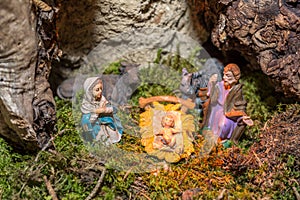 Christmas nativity scene represented with statuettes of Mary, Joseph and baby Jesus