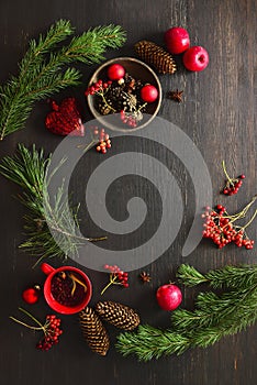 Christmas natural decor stuff on moody rustic table surface