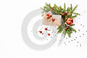 Christmas or New Year background, composition made of red Xmas decorations, gifts and fir branches on white background