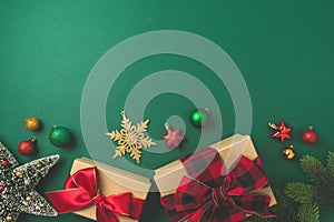 Christmas and New Year background with gift box, ornaments and decorations. Greeting card or banner design. Top view, flat lay