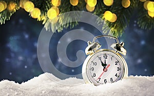 Christmas or New Year background with Golden alarm clock in snowdrifts on blue background with pine cones, fir tree, holiday
