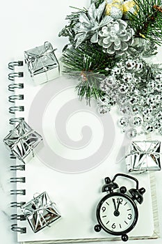 Christmas and New Year background with notepad and decorations. To make a to-do list or a list of promises, choose a place for