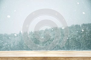 Christmas and New year background. Wooden table with winter snow