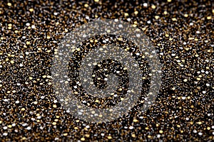 Christmas New Year Black and Gold Glitter background. Holiday abstract texture fabric