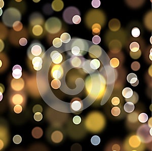 Christmas and New Year bokeh light holiday background. Abstract gold bokeh light on black color background.
