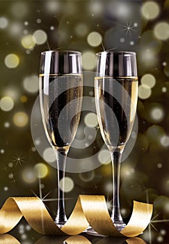 Christmas and New Year celebration with champagne. New Year holiday decorated table. Two Champagne Glasses