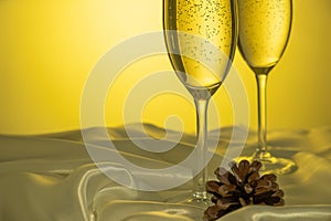 Christmas and New Year celebration with champagne. Two Champagne Glasses with Christmas decor