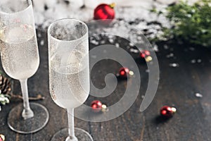 Christmas and New Year celebration with glasses of champagne