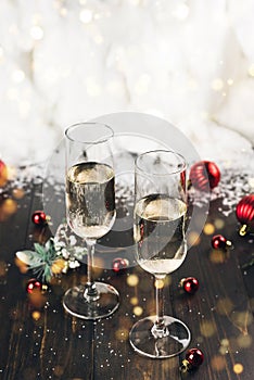 Christmas and New Year celebration with glasses of champagne